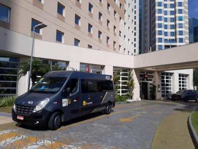 Precisa de traslado para o aeroporto, porto ou hotel?